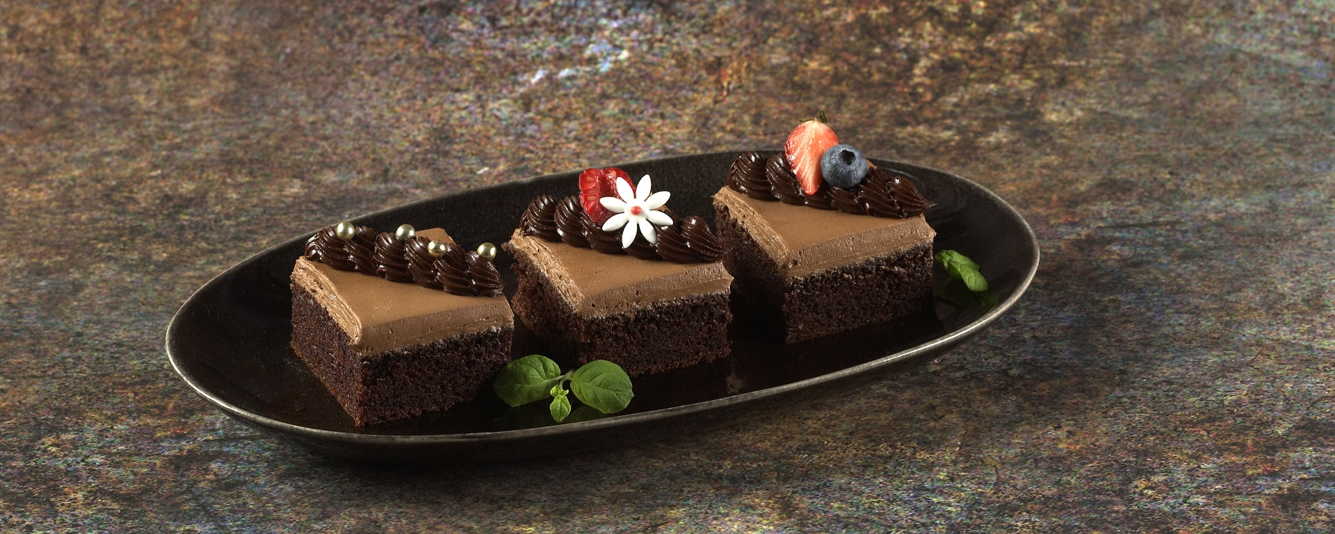 Sjokoladekake med lekker dekor? Få de beste dekortipsene fra proffene på konditorlandslaget.